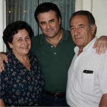 Marcello with his parents, Santa and Michele Guagliardo, in 1990